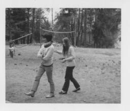 Two ARTS I Students by the Volleyball Net