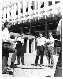 Faculty in front of Library Building