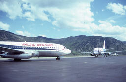 Two Pacific Western Airplanes.